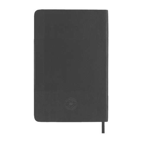 Libreta ecológica CRAFTT SC11 tamaño A5 (14.4 x 21 cm), con 100 hojas y cubierta suave hecha de botellas y papel reciclado. Ideal para notas, bocetos o diario. Diseño resistente, profesional y sustentable.